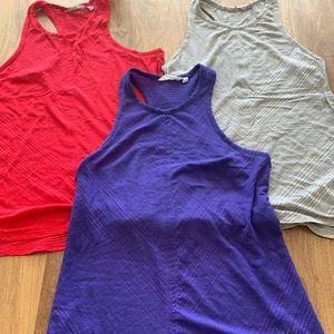 3 Athleta Illuminate racer back tanks M S